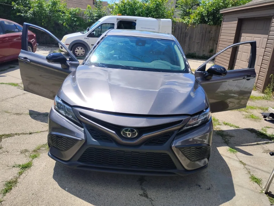 Mobile windshield replacement on a Toyota Camry at a customer location